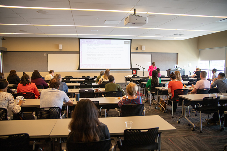 Dr. Linda Tillman giving her presentation to the group.